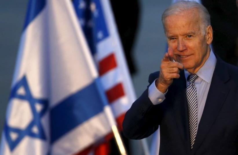 Vice President Joe Biden gestures after arriving at Ben-Gurion Airport (photo credit: REUTERS)