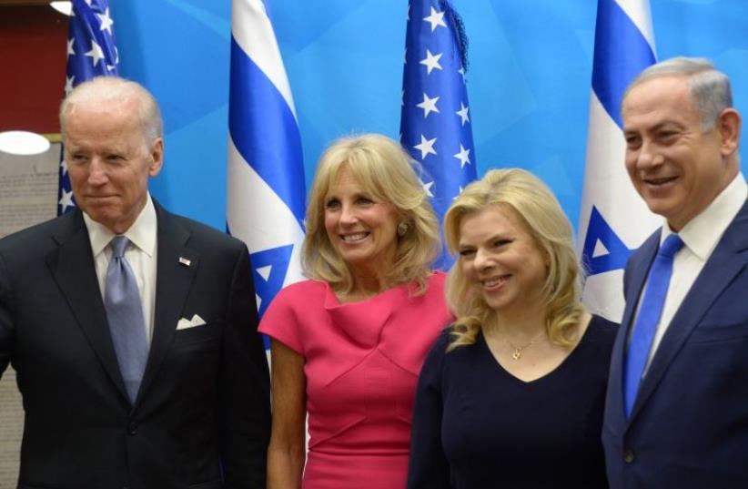 Joe and Jill Biden are greeted by Benjamin and Sara Netanyahu (photo credit: AMOS BEN GERSHOM, GPO)