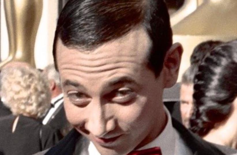 Actor Paul Reubens as "Pee-wee Herman" at the 60th Academy Awards, 1988  (photo credit: ALAN LIGHT/WIKIMEDIA COMMONS)
