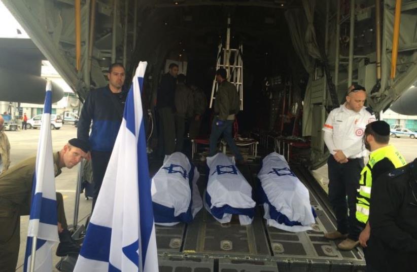 The coffins of three Israelis killed in the Istanbul suicide bombing are loaded onto an IAF transport plane (photo credit: FOREIGN MINISTRY)