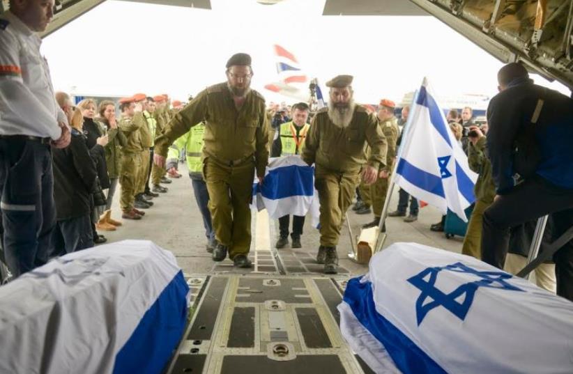 IDF chaplains accompany the body of an Israeli victim of the Istanbul suicide bombing