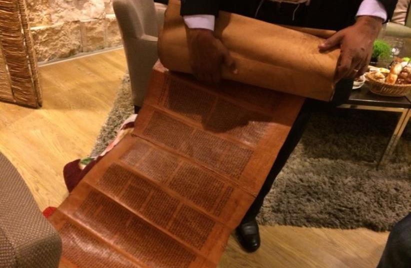 500-600-year-old torah scroll brought from Yemen (photo credit: ARIELLE DI-PORTO FOR THE JEWISH AGENCY FOR ISRAEL)