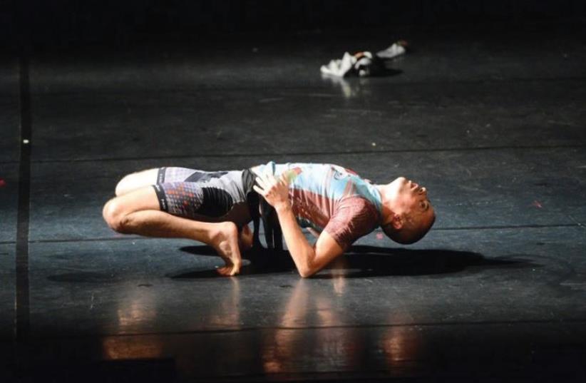 WHALE OF a tale: Choreographer and dancer Oded Ronen performs in ‘Whale Dream.’ (photo credit: REBECCA KOWALSKI)