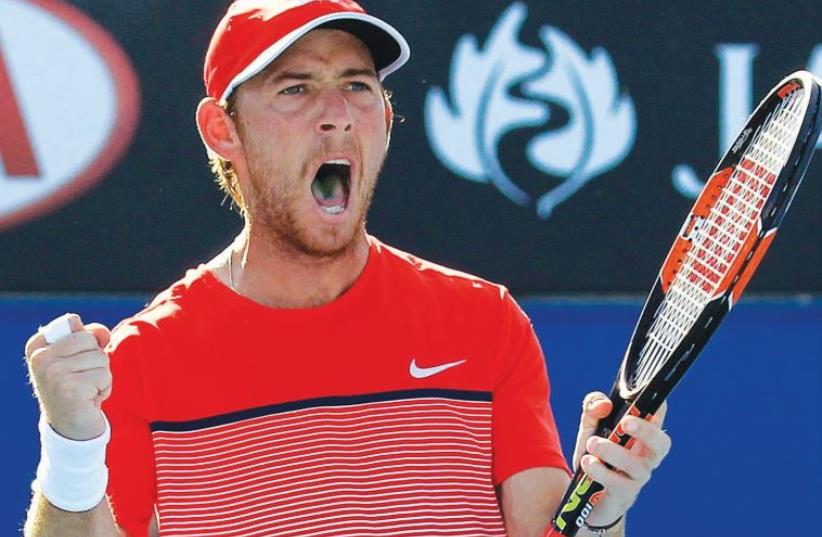 Dudi Sela claimed his 20th ATP Tour Challenger circuit title yesterday, lifting the winner’s trophy in Shenzhen, China (photo credit: REUTERS)