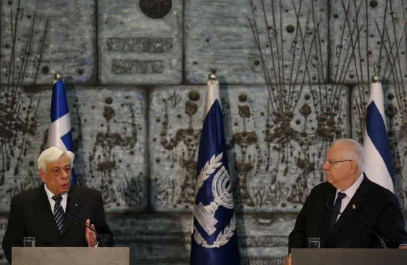 Greek President Prokopis Pavlopoulos (L) speaks as he delivers a joint statement with his Israeli counterpart Reuven Rivlin in Jerusalem March 30, 2016 (photo credit: REUTERS)