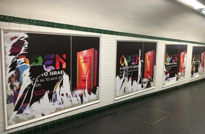 Vandalized ad for 'Open a Door to Israel' in Paris (photo credit: Courtesy)