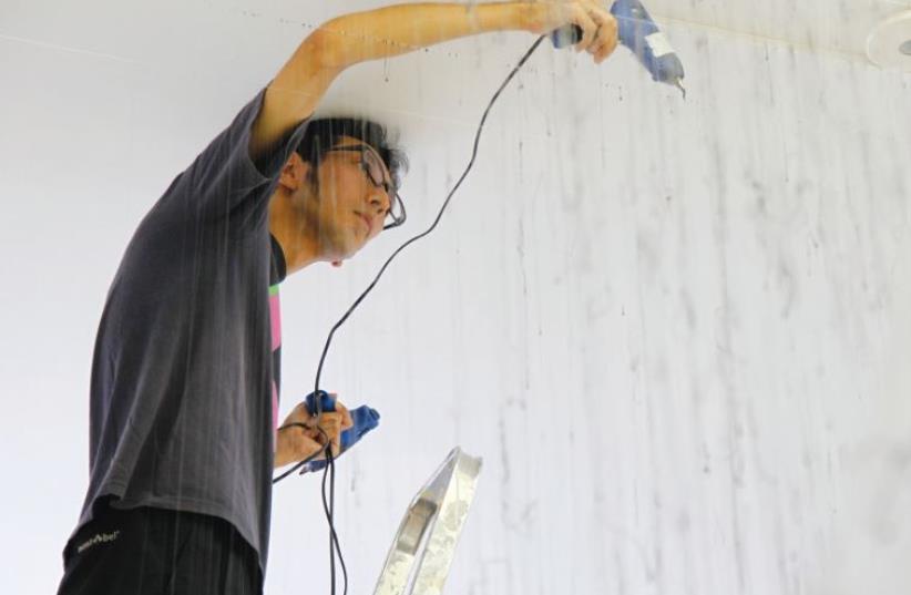‘ONE OF the reasons to use glue, for me, is that we cannot see the glue part in daily life.... It’s like molding the invisible. To take something we can’t usually see and build something out of it,’ says Japanese installation artist Yasuaki Onishi. (photo credit: Courtesy)