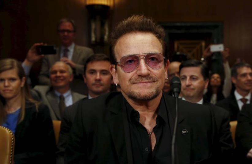U2 lead singer Bono attends a Senate Appropriations State, Foreign Operations and Related Programs Subcommittee hearing on causes and consequences of violent extremism and the role of foreign assistance on Capitol Hill in Washington April 12, 2016.  (photo credit: REUTERS)