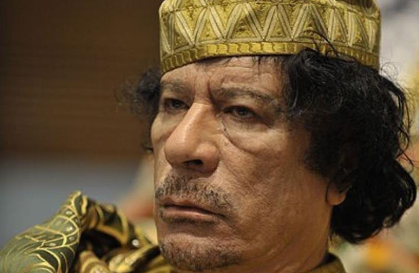 Muammar Gaddafi  (photo credit: WIKIMEDIA COMMONS/US NAVY/JESSE B. AWALT)
