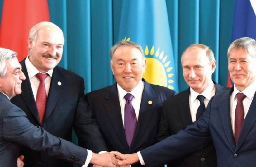 MEETING OF (from left to right) President Serzh Sargsyan of Armenia, President Alexander Lukashenko of Belarus, President Nursultan Nazarbayev of Kazakhstan, President Vladimir Putin of Russia and President Almazbek Atambayev of Kyrgyz Republic. (photo credit: Courtesy)
