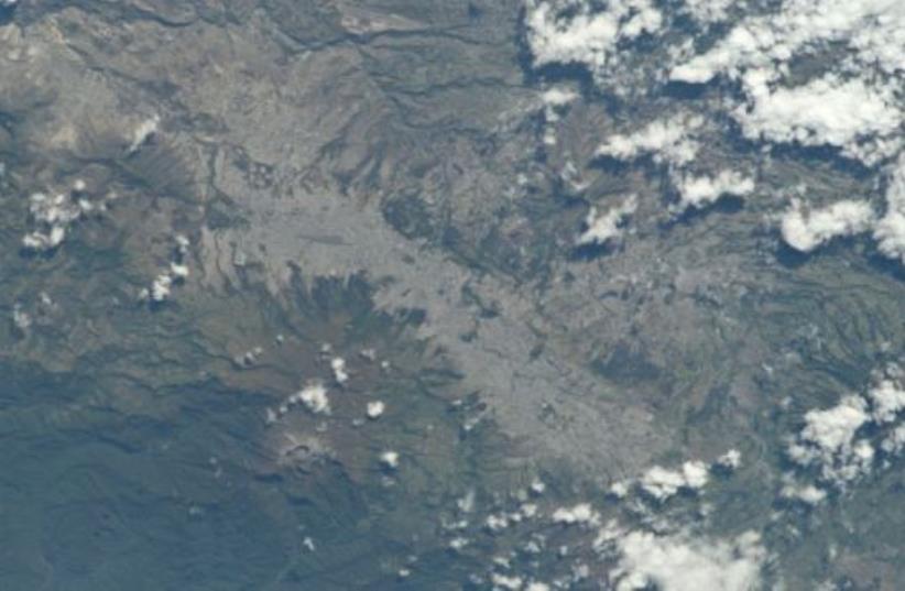 Astronaut Photo of Quito, Ecuador taken from the International Space Station (ISS) during Expedition 28 on September 5, 2011. (photo credit: NASA)