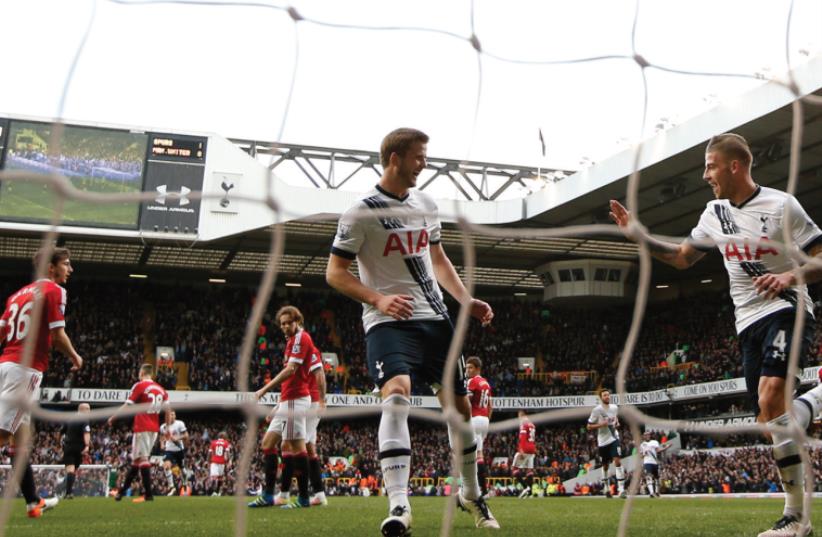 TOBY ALDERWEIRELD celebrates with Eric Dier after scoring the second goal for Tottenham. (photo credit: REUTERS)
