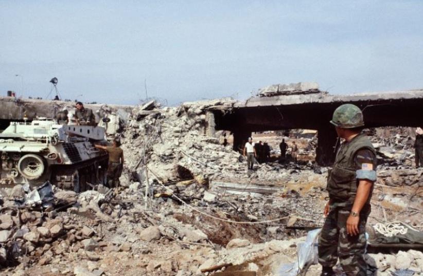 US marines continue to search for victims after a terrorist attack against the headquarters of US troops stationed in Beirut on October 31, 1983 (photo credit: AFP PHOTO)