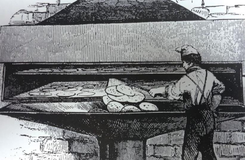 AN ILLUSTRATION from 1858 of matza being made in a New York bakery on Division Street owned by Mark Isaacs (photo credit: AMERICAN HERITAGE HAGGADAH)