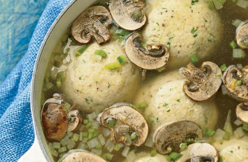 Matza-ball soup with mushrooms and jalapeño peppers (photo credit: ELLEN SILVERMAN)