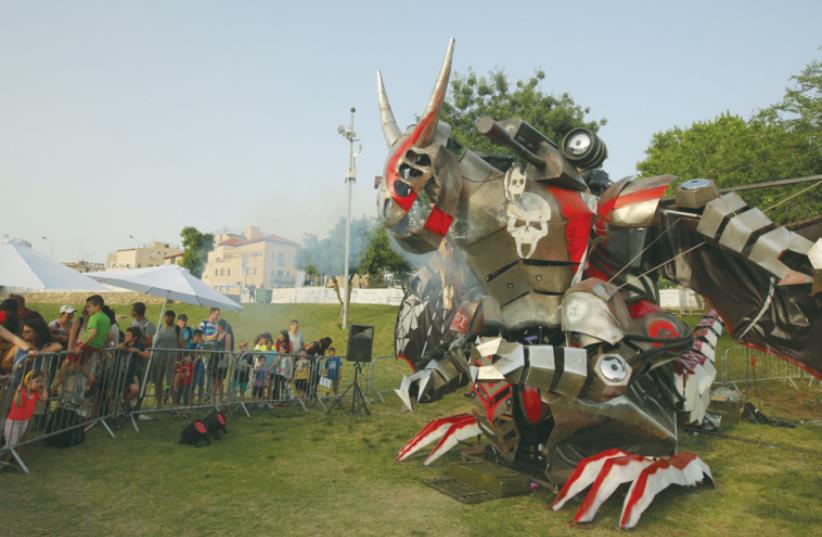THE DRAGON ROBOT displays its abilities at the capital’s Geek PicNic festival this week. (photo credit: MARC ISRAEL SELLEM/THE JERUSALEM POST)