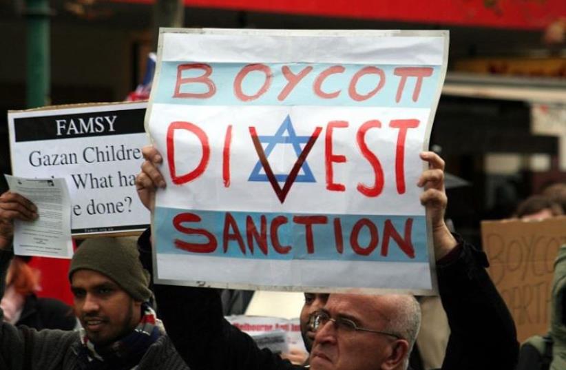 Activists from the BDS movement against Israel [File] (photo credit: Wikimedia Commons)