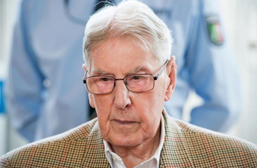 Former Nazi SS officer Reinhold Hanning appears in court in Germany (photo credit: AFP PHOTO)
