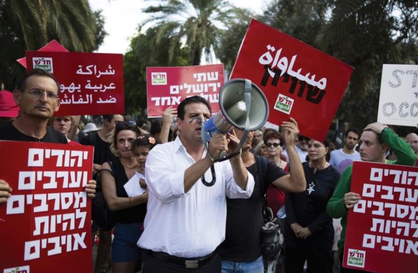 JOINT LIST leader Ayman Odeh leading a protest march in October (photo credit: REUTERS)