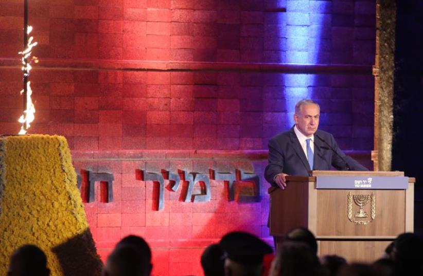 Prime Minister Benjamin netanyahu speaks at the Yad Vashem Holocaust Remembrance Day ceremony (photo credit: MARC ISRAEL SELLEM/THE JERUSALEM POST)