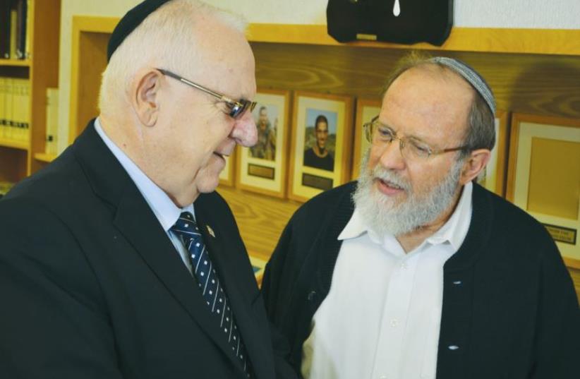 President Reuven Rivlin meets with Rabbi Eli Sadan in 2014 (photo credit: Courtesy)