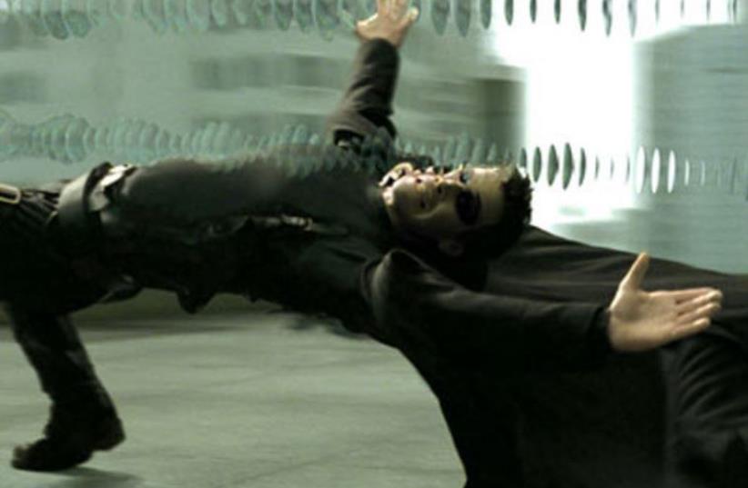 Keanu Reeves as Neo in the Matrix trilogy, a huge leap forward in terms of slow motion cinema (photo credit: GOOGLE)