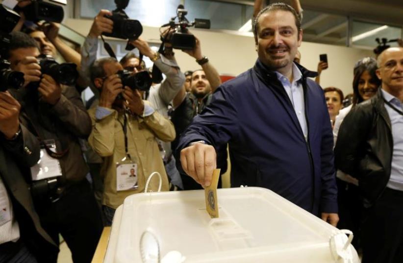 Lebanon's former Prime Minister Saad al-Hariri casts his ballot at a polling station during Beirut's municipal elections (photo credit: REUTERS)