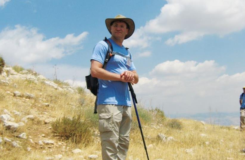 AKIM-Jerusalem trek leader Ian Brown on a sponsored walk. (photo credit: MIRIAM MARCUS)