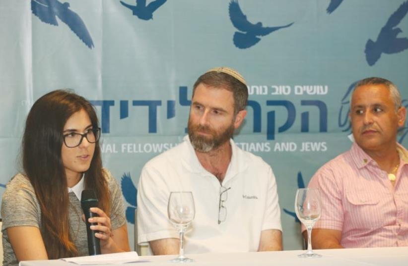 MAYA RAHIMI, Natan Meir and Ofer Cohen (left to right) share personal stories of grief and endurance at IFCJ’s Remembrance Day event in Jerusalem on Monday to honor victims of terrorist attacks. (photo credit: ICFJ)