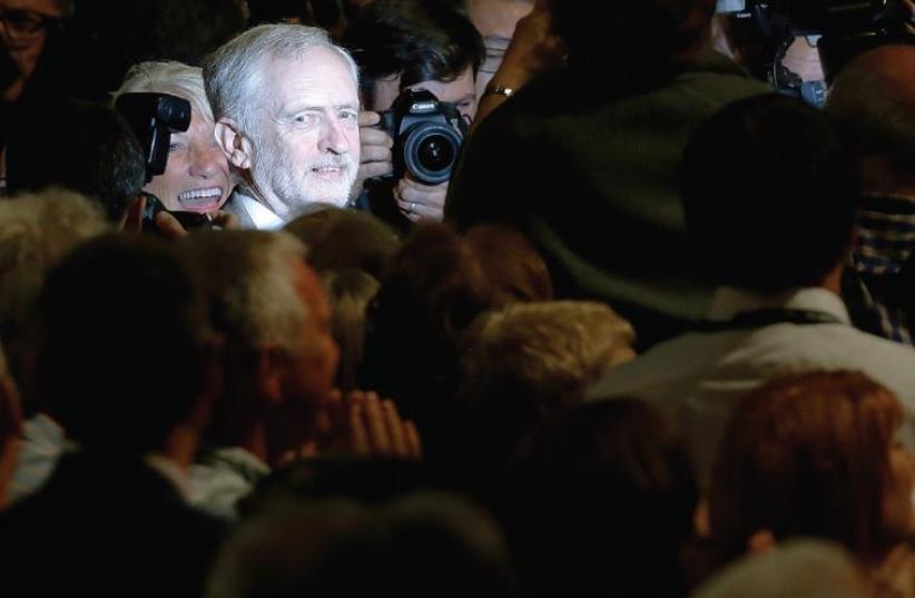 BRITISH LABOUR leader Jeremy Corbyn leaves after delivering his keynote speech at the party’s annual conference in Brighton in September 2015. ( (photo credit: REUTERS)