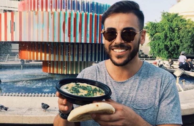  'Hot Dudes Eating Hummus' Instagram page (photo credit: INSTAGRAM)