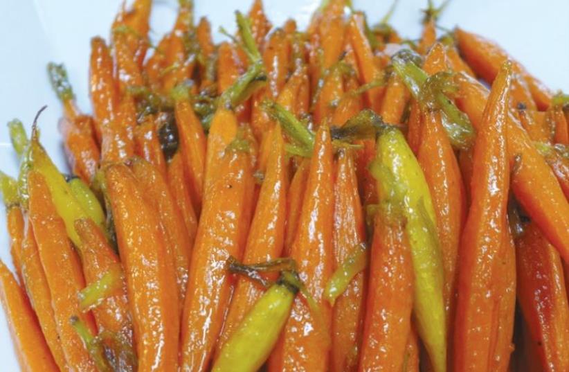 Honey-glazed carrots (photo credit: YAKIR LEVY)