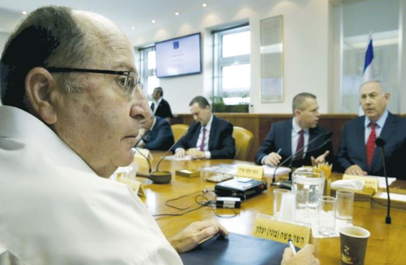 Ya’alon takes part in the weekly cabinet meeting (photo credit: REUTERS)