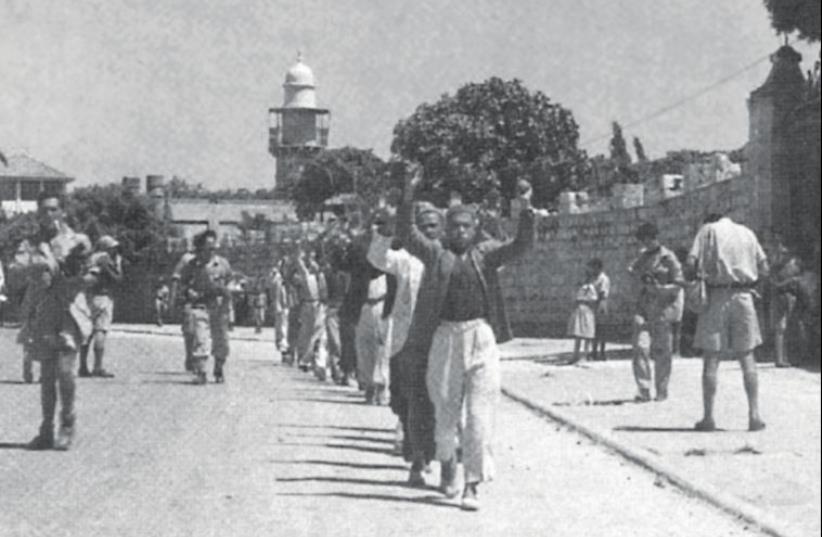 Arab forces surrender to victorious Israelis in Ramla in 1948 (photo credit: Wikimedia Commons)