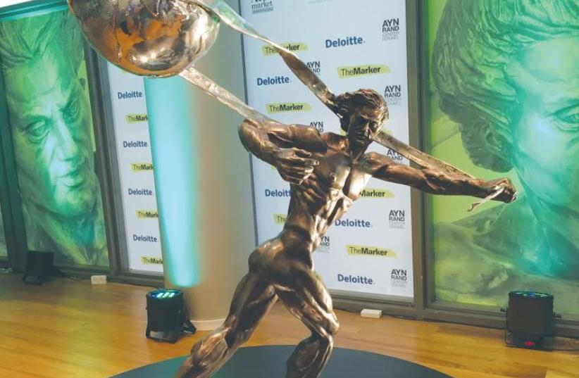 THIS ATLAS SHRUGGED model sculpture by Richard Minns is displayed in the lobby of the Tel Aviv Stock Exchange, where Moovit received it at the Atlas Award ceremony (photo credit: NIV ELIS)