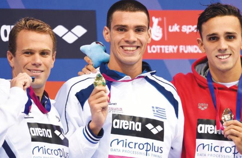 Israel’s Gal Nevo (left) won his second career medal at the European Swimming Championships in London (photo credit: REUTERS)
