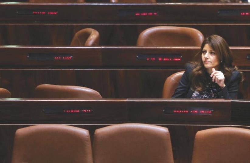 MK ORLY LEVY-ABECASSIS is pictured alone in the Knesset in this photo from January 2015 (photo credit: MARC ISRAEL SELLEM)
