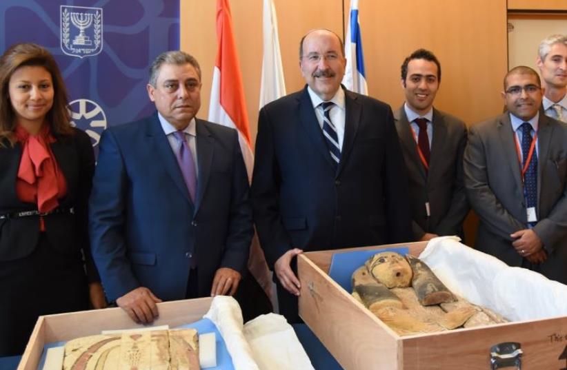 Foreign Ministry hands over two ancient relics from Pharaonic times to the ambassador of Egypt  (photo credit: COURTESY FOREIGN MINISTRY)