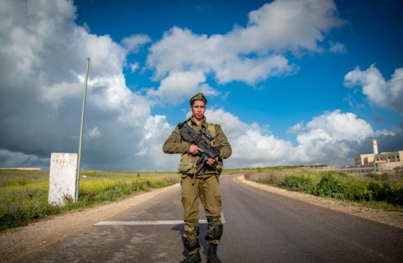An IDF soldier from the Golani Brigade trains in northern Israel (photo credit: IDF SPOKESPERSON'S UNIT)