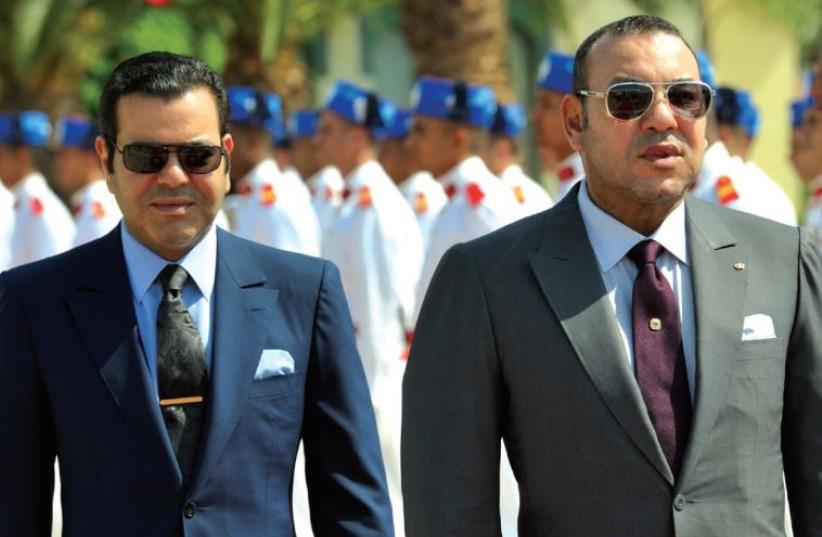 Moroccan king Mohammed VI (right) and his brother Prince Moulay Rachid in the Moroccan capital Rabat in September 2011 (photo credit: PHILIPPE WOJAZER / REUTERS)