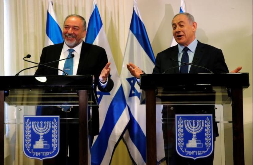 Avigdor Lieberman, head of far-right Yisrael Beitenu party, (L) and Israeli Prime Minister Benjamin Netanyahu (photo credit: REUTERS)