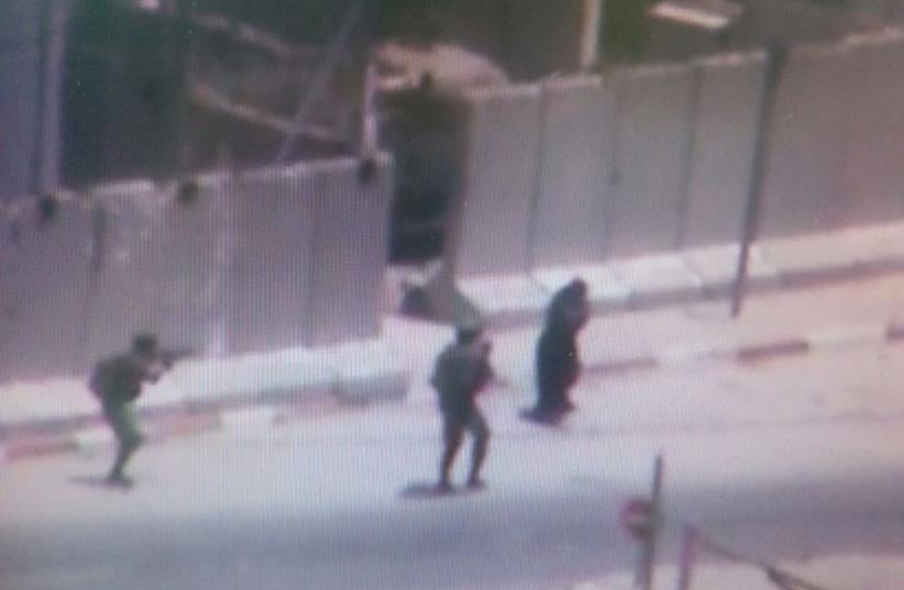 Still from scene of attempted stabbing attack on IDF soldiers in the West Bank, June 2, 2016 (photo credit: Courtesy)