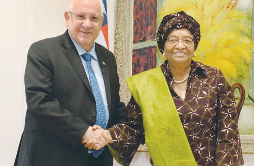 PRESIDENT REUVEN RIVLIN yesterday welcomes Liberian President Ellen Johnson-Sirleaf to his official residence. (photo credit: GPO)