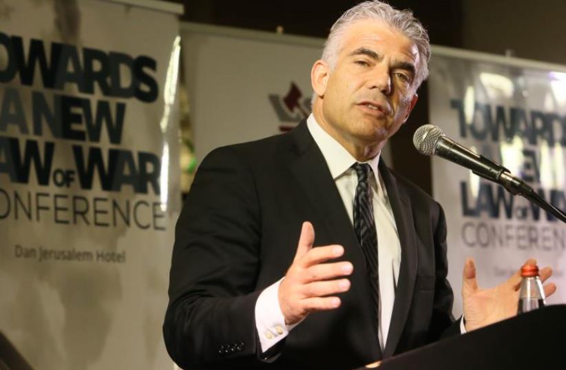 Yair Lapid at 'Shurat Hadin' conference in Jerusalem (photo credit: ODED ANTMAN)