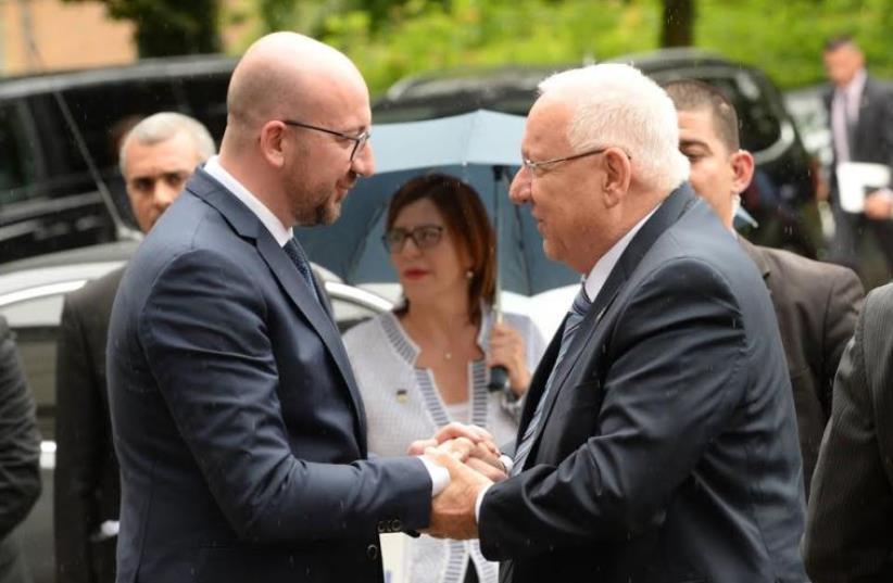 Belgian Prime Minister pledges with Israeli Presiden Reuven Rivlin to continue to fight against anti-Semitism (photo credit: MARK NEYMAN / GPO)