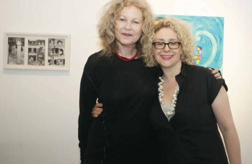 Dr. Dalia Manor, director and curator of the Negev museum of Art (left) and Sara Lightman, exhibition curator (photo credit: OR ALEXENBERG)