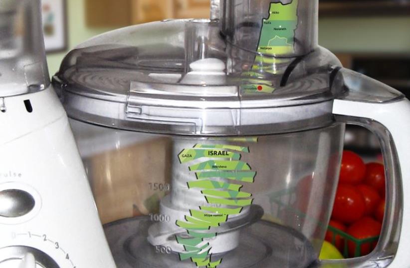 A food processor with the cut-up map of Israel inside. (photo credit: RONO LUBIN)