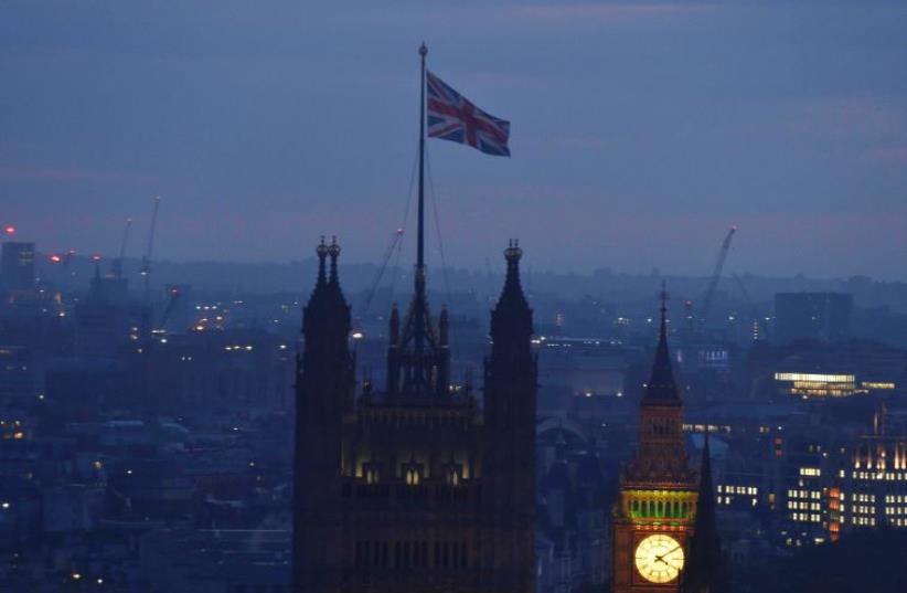 Dawn breaks over London as votes are counted for the EU referendum (photo credit: REUTERS/TOBY MELVILLE)