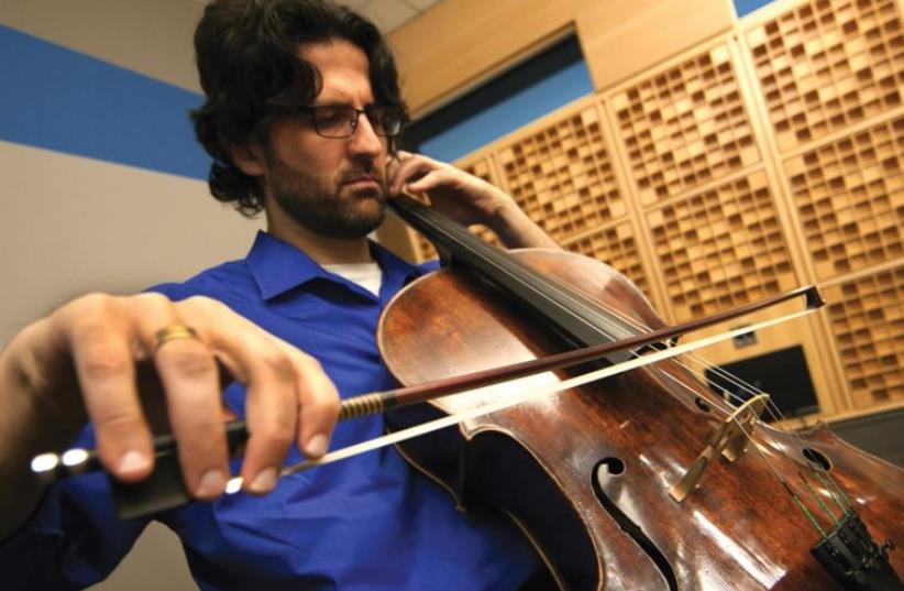 ISRAELI-AMERICAN cellist Amit Peled says he wishes his turkey-farmer grandfather were alive to watch him perform on the Casals cello. (photo credit: AMITPELED.COM)
