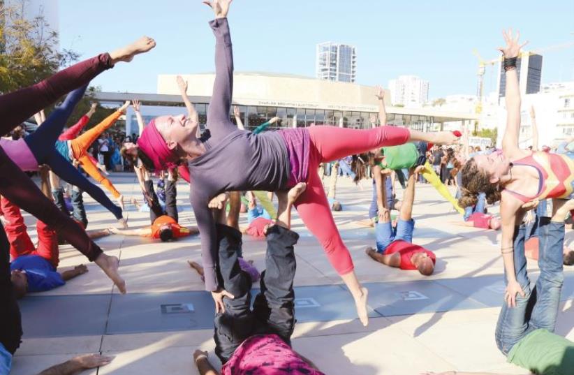 The instructor at the record-setting flash mob in Tel Aviv’s Habima Square this past March (photo credit: DAVID ABITBOL)